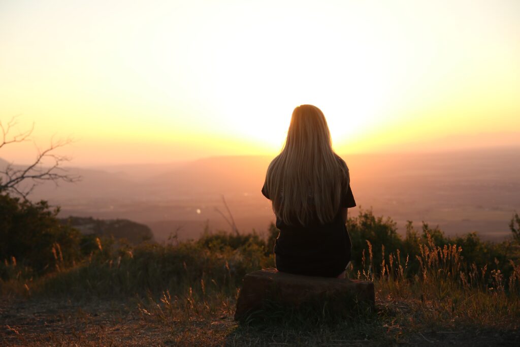 Woman practicing mindfulness to improve her mindset